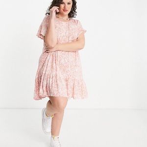 En Creme Plus smock dress with pleated hem in pink floral